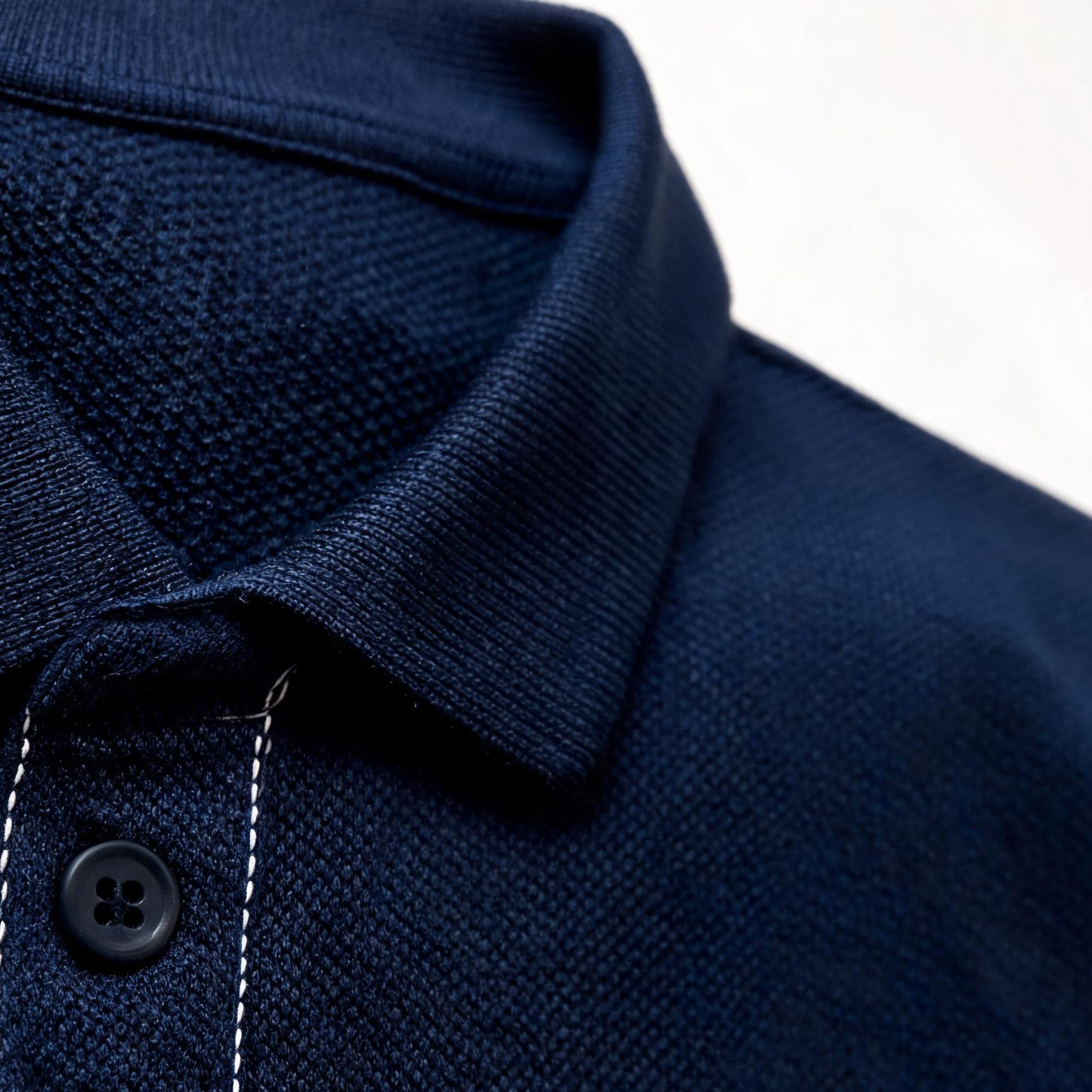 Close-up of polo shirt collar stitching